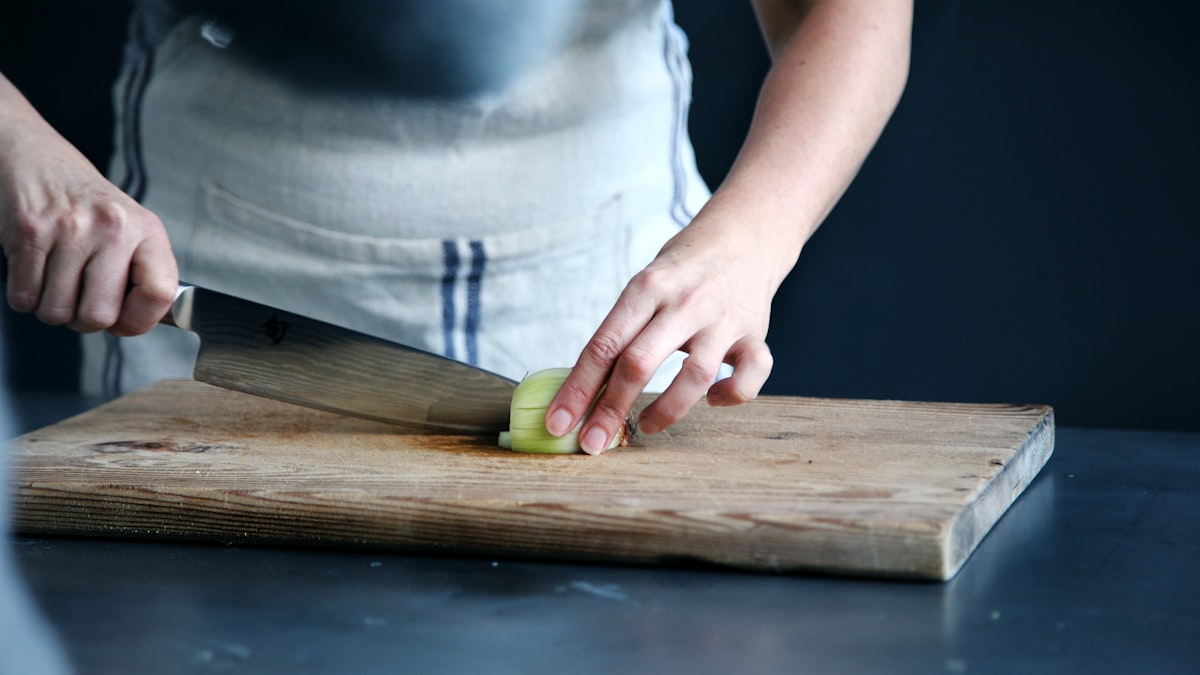 Fresh vegetables and healthy ingredients arranged on a kitchen counter